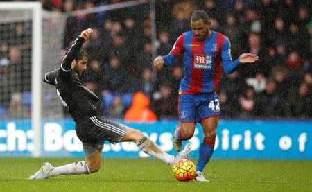 Football Soccer - Crystal Palace v Chelsea - Barclays Premier League - Selhurst Park - 3/1/16 Chelsea's Csc Fabregas in action with Crystal Palace's Jason Puncheon Action Images via Reuters / John Sibley Livepic