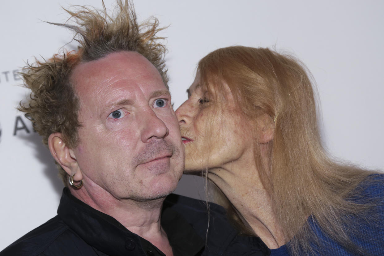 John Lydon, known as Johnny Rotten, left, and Nora Forster attend a screening of 