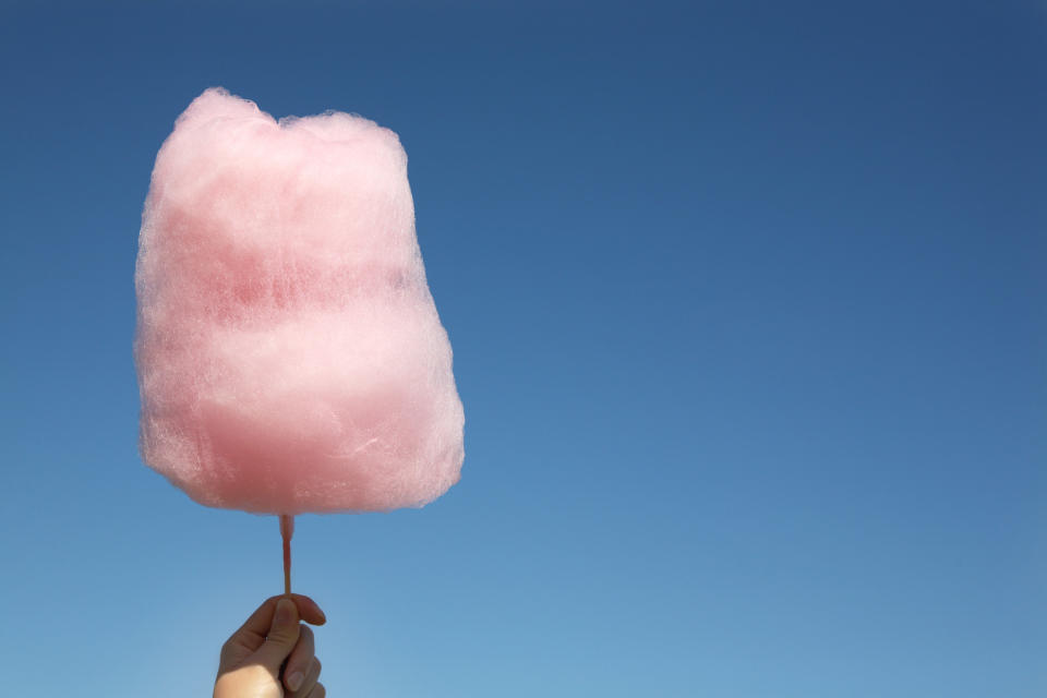 hand holding cotton candy