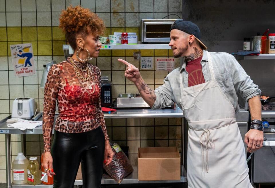 From left, Karen Stephens as Clyde stares down Kristian Bikic’s angry Jason in Zoetic Stage’s “Clyde’s” at the Arsht Center. (Photo courtesy of Morgan Sophia Photography)