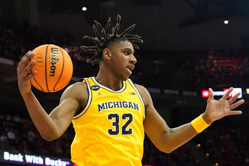 Michigan forward Tarris Reed Jr. rebounds the ball against Wisconsin during the second half of U-M's 64-59 loss on Tuesday, Feb. 14, 2023, in Madison, Wisconsin.