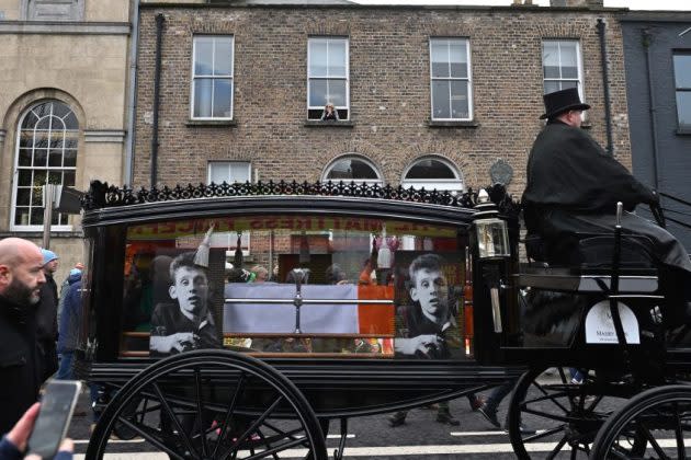 Shane MacGowan's Funeral: Nick Cave Sings, Johnny Depp Is Pallbearer as  Mourners Dance in Aisles