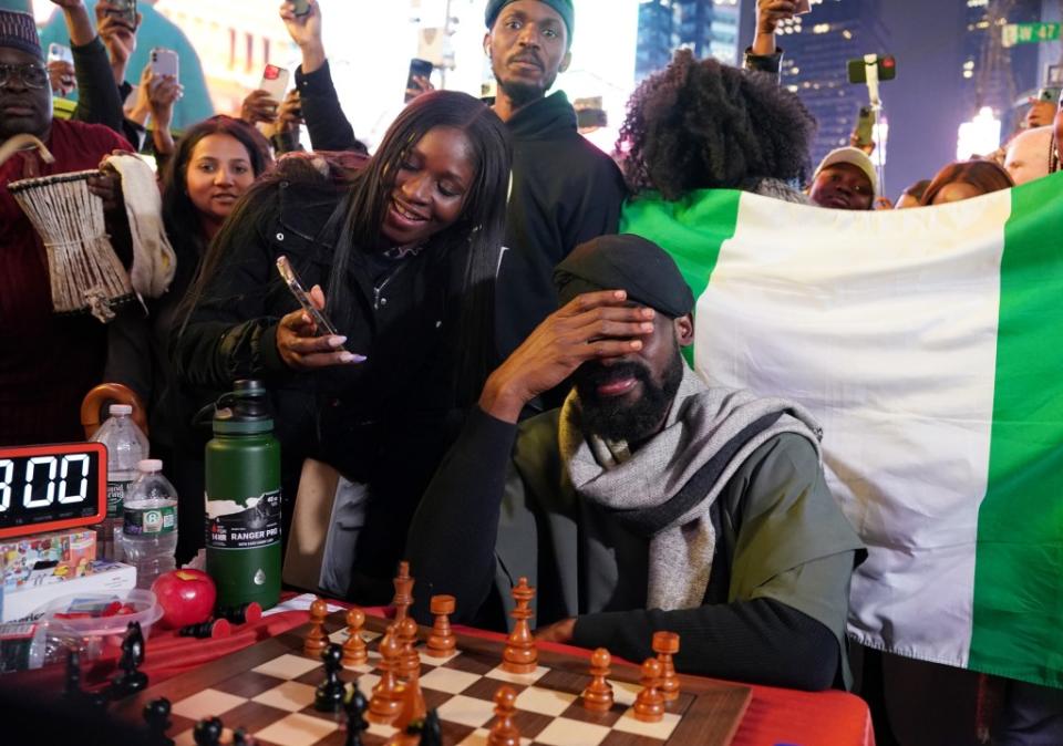 Onakoya broke the Guinness world record for continuously playing chess for 60 hours in the Times Square section of New York, NY, on April 19, 2024. Christopher Sadowski