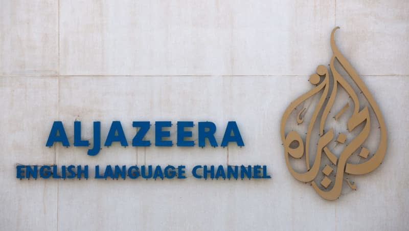 The logo of the Arabic news broadcaster Al Jazeera is seen at its headquarters in Doha, Qatar. Israel approves 'Al Jazeera' law to allow closure of foreign channels. picture alliance / dpa