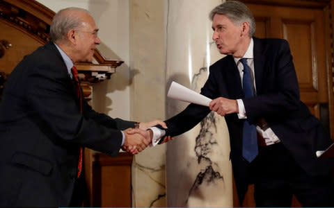 Angel Gurria, Secretary-General of the OECD, and Philip Hammond, the Chancellor