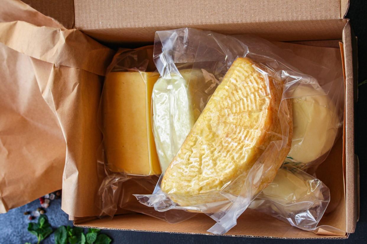 Cheese Stored in Plastic Wrap in Box