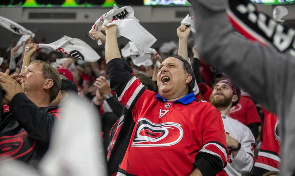 Carolina Hurricanes fans show their support for goalie Frederik Andersen (31) after a save in the first period against the New Jersey Devils during Game 2 of their second round Stanley Cup playoff series on Friday, May 5, 2023 at PNC Arena in Raleigh, N.C.