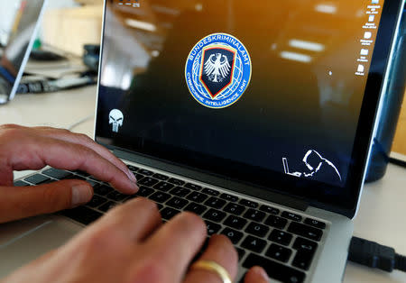 An investigator of the Cybercrime Intelligence Unit of Germany's Bundeskriminalamt (BKA) Federal Crime Office is pictured during a media day in Wiesbaden, Germany, July 27, 2016. REUTERS/Ralph Orlowski