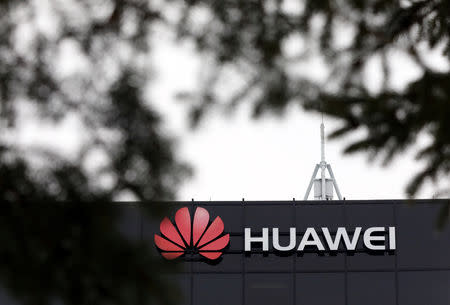 FILE PHOTO: The Huawei logo is pictured outside their research facility in Ottawa, Ontario, Canada, December 6, 2018. REUTERS/Chris Wattie