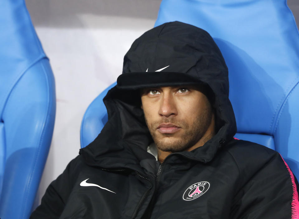 PSG's Neymar sits on the bench after loosing the French Cup soccer final between Rennes and Paris Saint Germain at the Stade de France stadium in Saint-Denis, outside Paris, France, Saturday, April 27, 2019. (AP Photo/Thibault Camus)