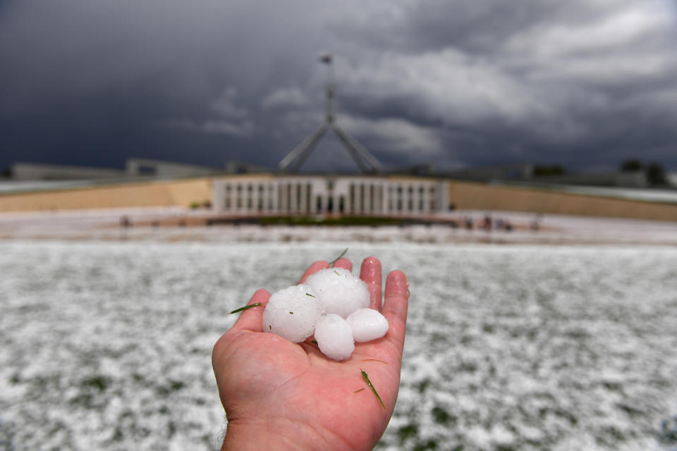 Golf ball size hail after a severe hail storm is seen at Parliament House in Canberra.