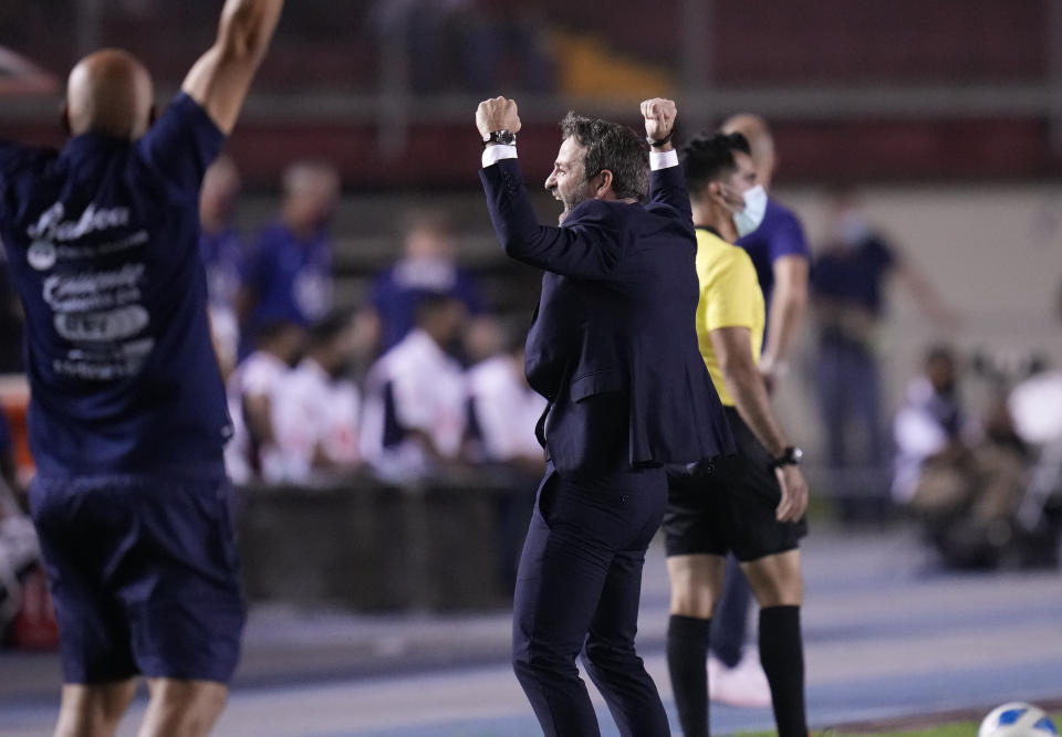 Panama's coach Thomas Christiansen celebrates his team's win over United States during a qualifying soccer match for the FIFA World Cup Qatar 2022 at Rommel Fernandez stadium, Panama city, Panama, Sunday, Oct. 10, 2021. Panama won 1-0. (AP Photo/Arnulfo Franco)