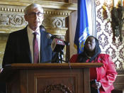 Wisconsin Gov. Tony Evers speaks during a news conference as Democratic state Rep. Sheila Stubbs listens Monday, May 20, 2019, in Madison, Wis. George Floyd's killing last year and the protests that followed led to a wave of police reforms in dozens of states, from changes in use-of-force policies to greater accountability for officers. At the same time, lawmakers in a handful of states have had success addressing racial inequities. Evers, a Democrat, on Wednesday, April 21, 2021 ordered the Wisconsin State Patrol and other state law enforcement agencies to update their use-of-force policies to prohibit chokeholds, unless as a last resort. (AP Photo/Scott Bauer)