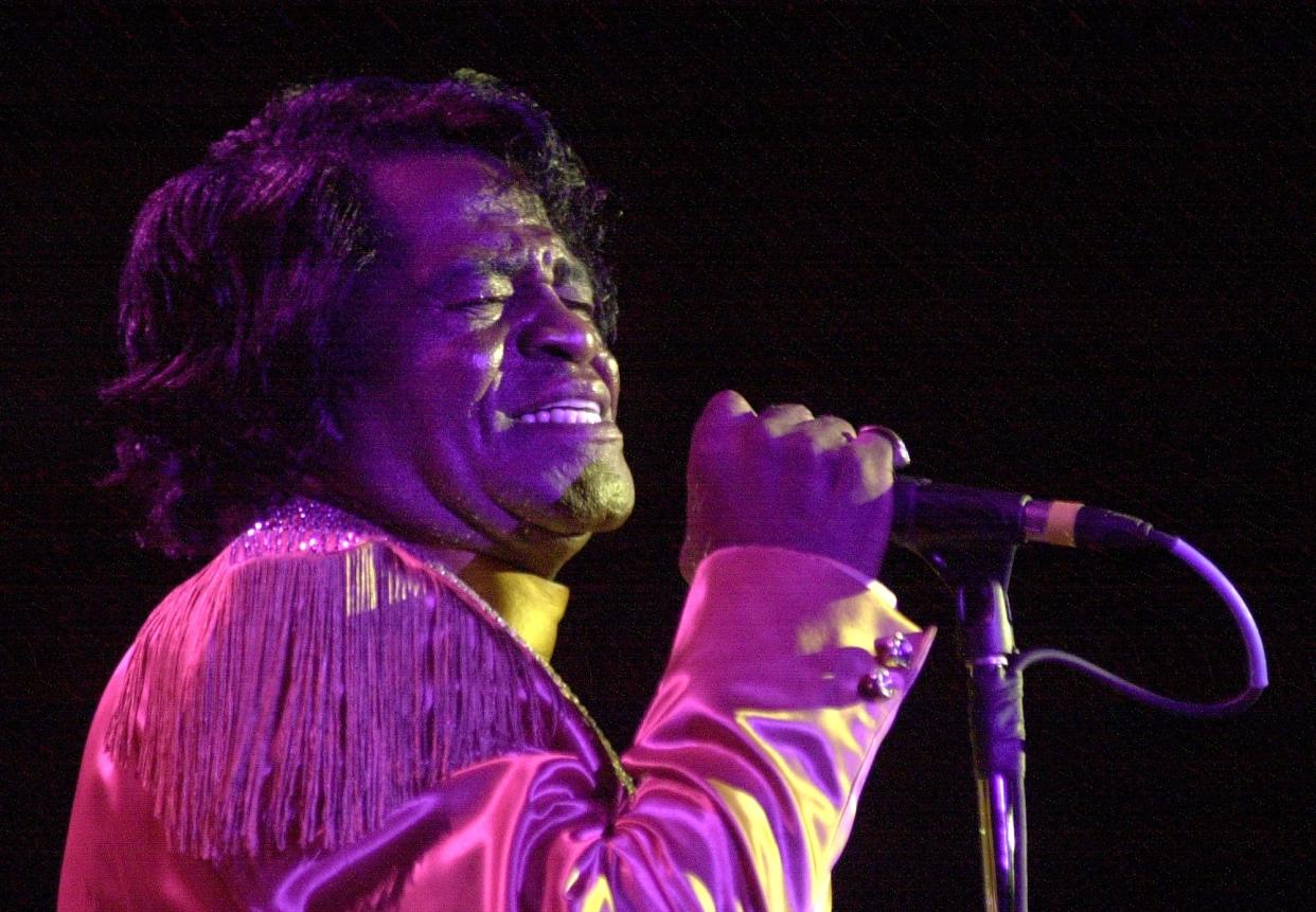 FILE - James Brown performing at the Augusta-Richmond County Civic Center in October 2000.