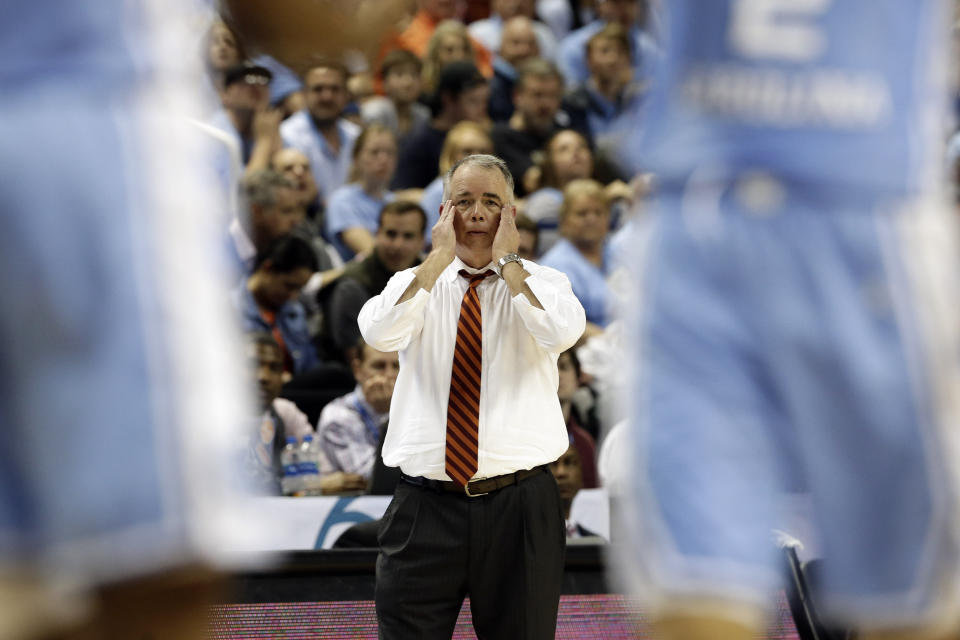 Virginia Tech head coach Mike Young reaqcts during the second half of an NCAA college basketball game against North Carolina at the Atlantic Coast Conference tournament in Greensboro, N.C., Tuesday, March 10, 2020. (AP Photo/Gerry Broome)
