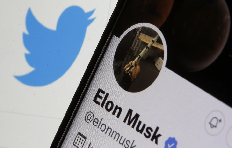 PARIS, FRANCE - MAY 13: In this photo illustration, the Elon Muskâ€™s Twitter account is displayed on the screen of an iPhone in front of a Twitter logo on May 13, 2022 in Paris, France. The U.S. multi-billionaire, Elon Musk indicated this Friday, May 13, to suspend the takeover of Twitter pending details on the proportion of fake accounts on the social network. Elon Musk bought the social network Twitter on Monday April 25 for the sum of 44 billion dollars. (Photo illustration by Chesnot/Getty Images)