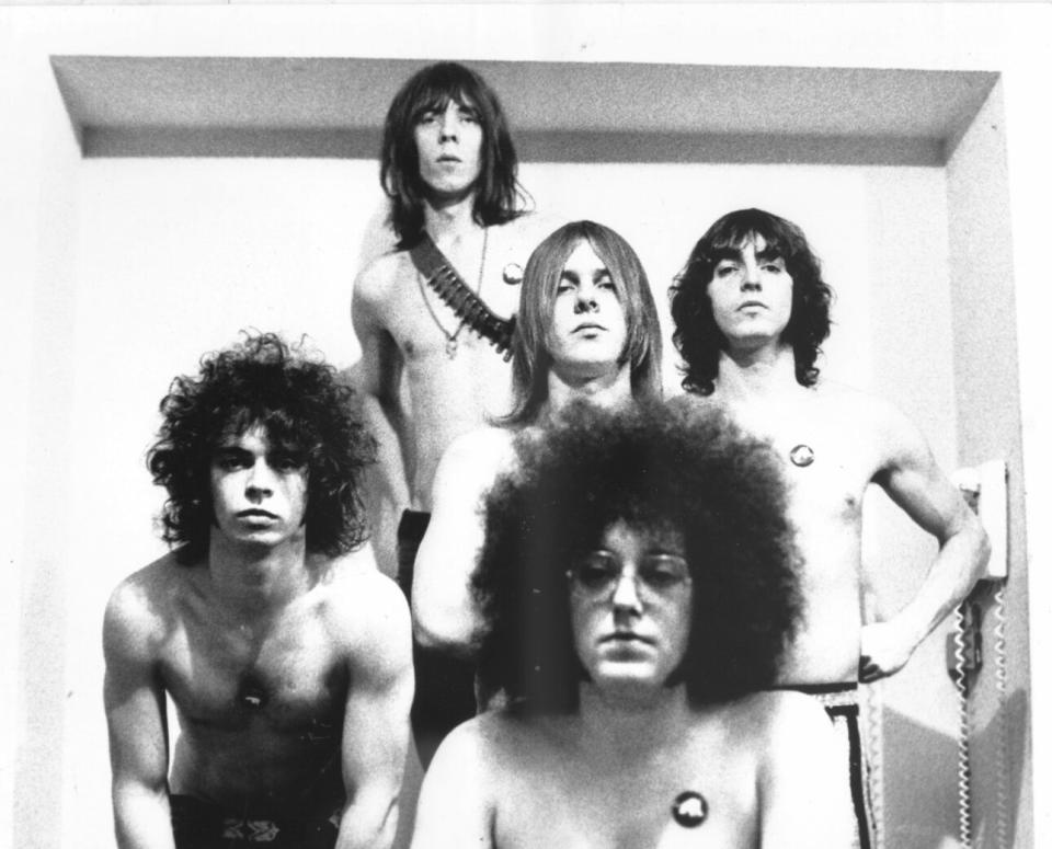 All five original members of the band MC5 pose in Ann Arbor, MI, in 1969. (Credit: Leni Sinclair/Getty Images)