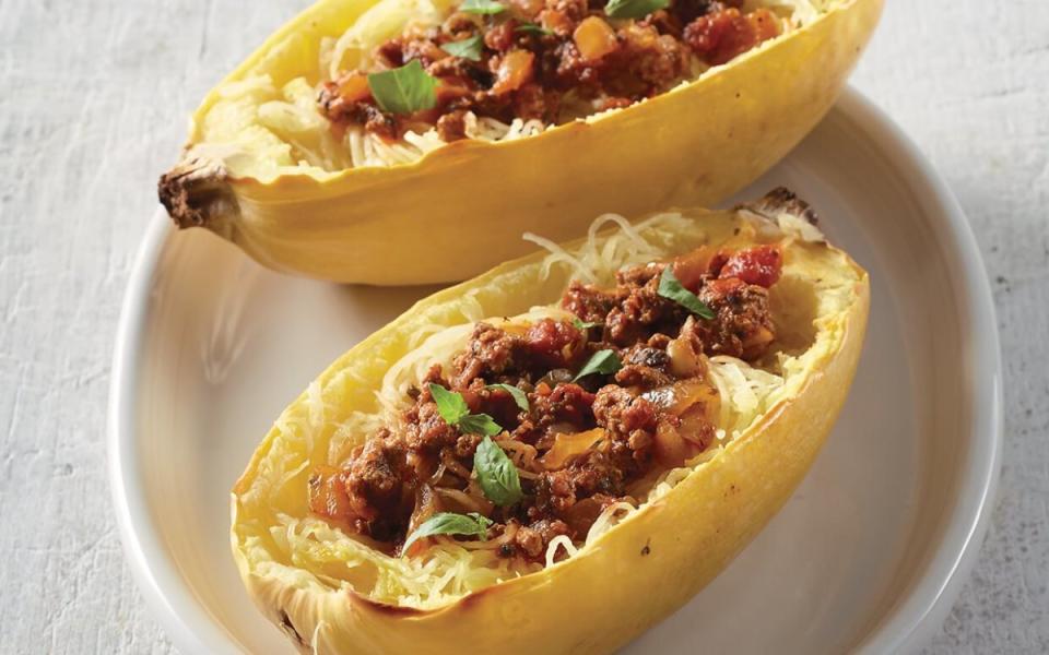 <p>Spaghetti squash makes a delicious carb-cutting alternative to pasta in this meal. Subbing ground turkey for beef means less saturated fat.</p><p><strong>Get the recipe: <a href="https://parade.com/842763/communitytable/slow-cooker-spaghetti-squash-with-turkey-meat-sauce/" rel="nofollow noopener" target="_blank" data-ylk="slk:Slow Cooker Spaghetti Squash with Turkey Meat Sauce;elm:context_link;itc:0;sec:content-canvas" class="link ">Slow Cooker Spaghetti Squash with Turkey Meat Sauce</a></strong></p>