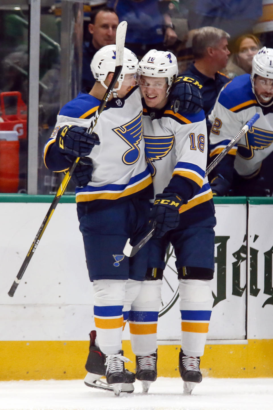 St. Louis Blues center Jordan Kyrou, left, hugs center Robert Thomas after Kyrou scored a goal against the Dallas Stars during the second period of an NHL hockey game in Dallas, Friday, Feb. 21, 2020. (AP Photo/Ray Carlin)