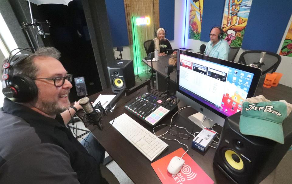 Producer Rob Fiorino works the controls as Jeep Beach founder Charlene Greer and her husband, Kurt, record a weekly podcast at Jeep Beach Radio studios in Daytona Beach. The success of the online radio station inspired the creation of the inaugural Jeep Beach Radio Music Fest at this year's Jeep Beach.