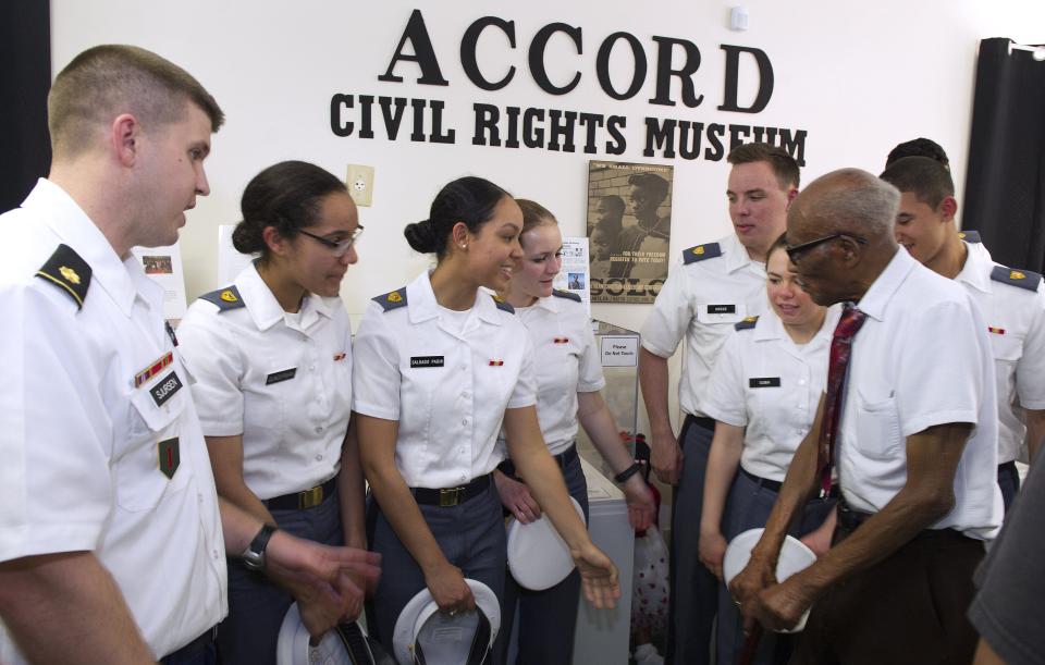 In 2016 cadets from the U.S. Military Academy in West Point, N.Y., talk with World War II veteran Sollie Mitchell, right, as they toured the ACCORD Civil Rights Museum in St. Augustine. The cadets were on a tour of important civil rights locations in St. Johns County. Mitchell served in the Eighth Army during World War II.