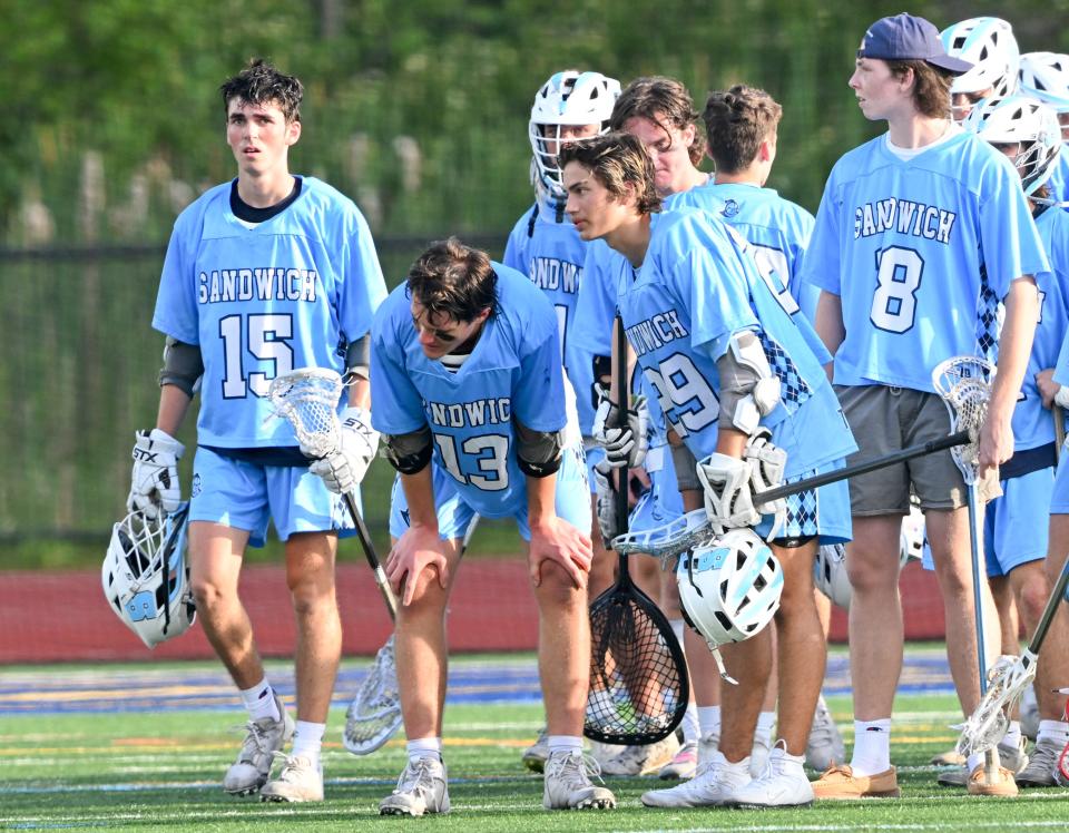 WORCESTER  6/22/22  The Sandwich team watches as  Wahconah Regional celebrates their win in the  boys Division 4 Final lacrosse match.