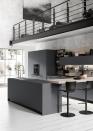 <p>This monochrome kitchen feels incredibly spacious. The white wooden floorboards complement the matte black cabinets, while the bar area joins the workspaces together providing a space for the family to sit.<strong><br></strong></p><p><strong>READ MORE:</strong> <a href="https://www.housebeautiful.com/uk/decorate/kitchen/a23569477/kitchen-colour-ideas/" rel="nofollow noopener" target="_blank" data-ylk="slk:7 kitchen colour ideas;elm:context_link;itc:0;sec:content-canvas" class="link ">7 kitchen colour ideas</a></p><p>• Shop the look at <a href="http://www.scavolini.design/" rel="nofollow noopener" target="_blank" data-ylk="slk:Scavolini Kitchens;elm:context_link;itc:0;sec:content-canvas" class="link ">Scavolini Kitchens</a></p>