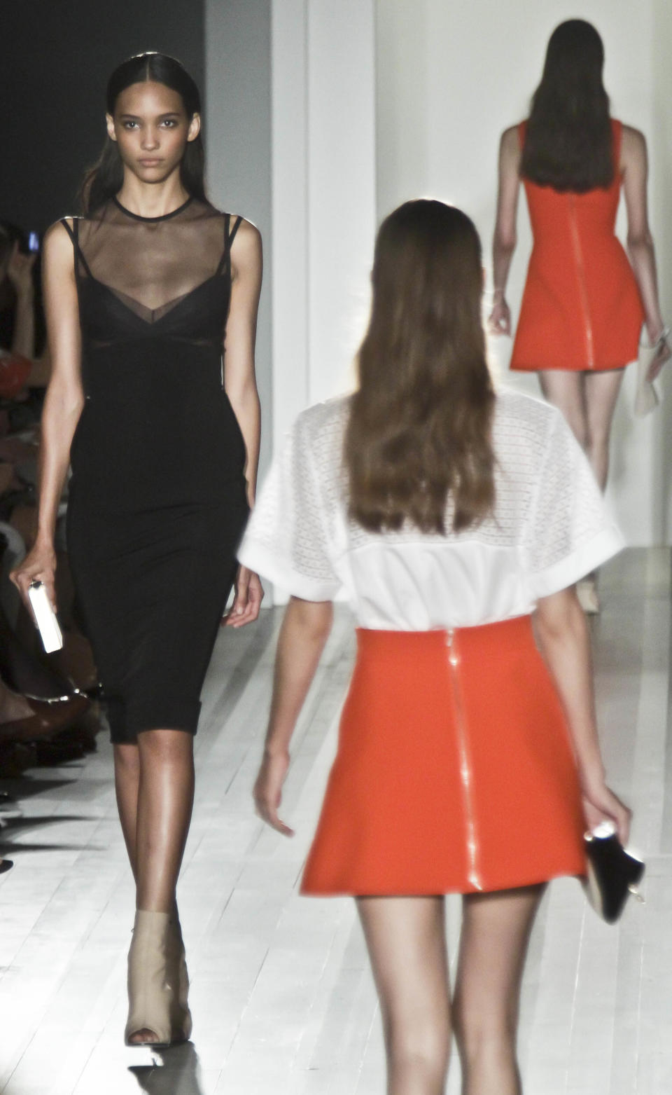 Fashion from the Spring 2013 collection of Victoria Beckham is modeled on Sunday, Sept. 9, 2012 in New York. (AP Photo/Bebeto Matthews)