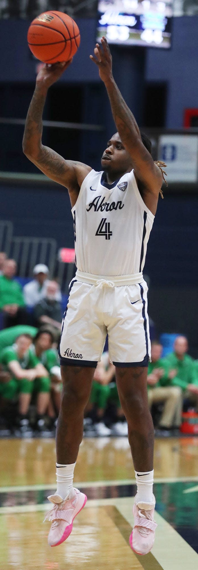 Bryan Trimble, shown shooting in a game earlier this season, scored 33 points in a 91-66 win over Bowling Green on Thursday night. [Mike Cardew/Beacon Journal]