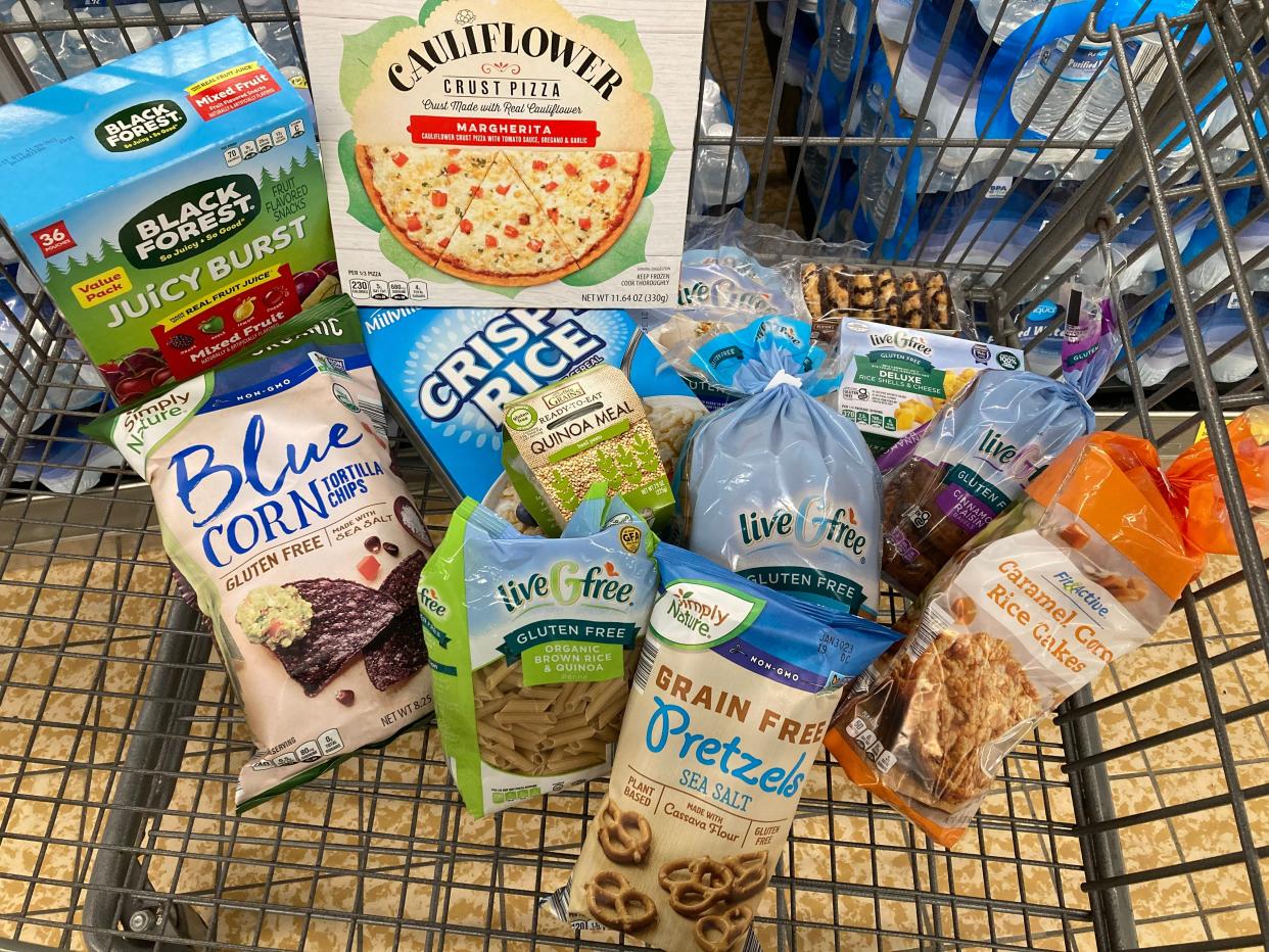 Cart full of gluten-free food in cart at Aldi