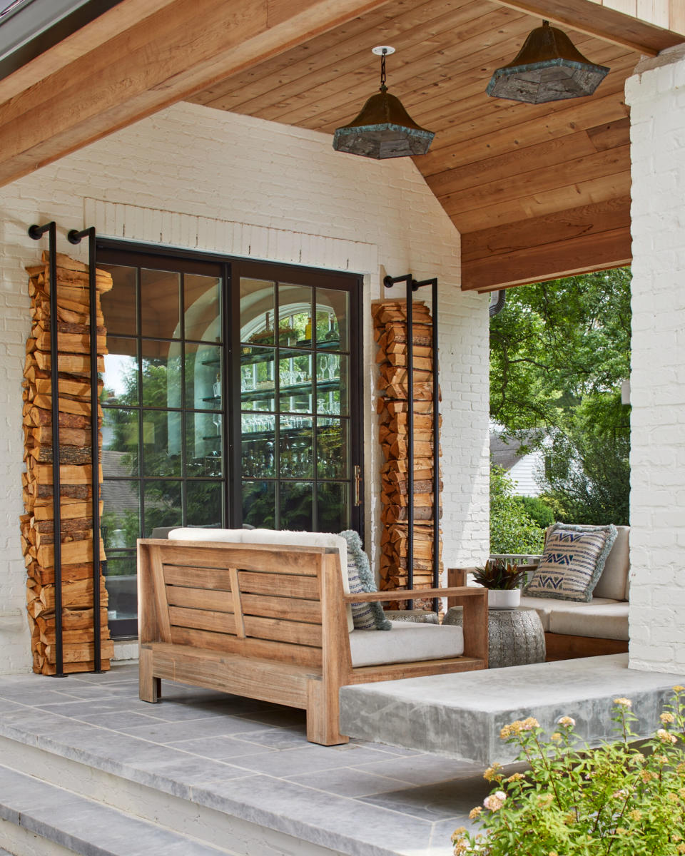 A backyard bench placed in a converational way