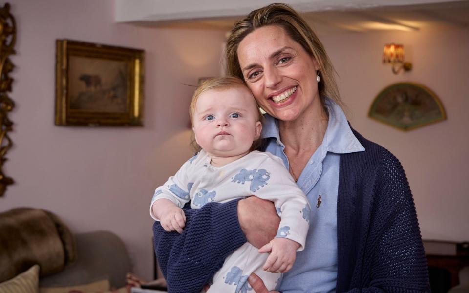 Arabella Byrne and her 6-month-old daughter Constance at their home in Longworth, Oxfordshire