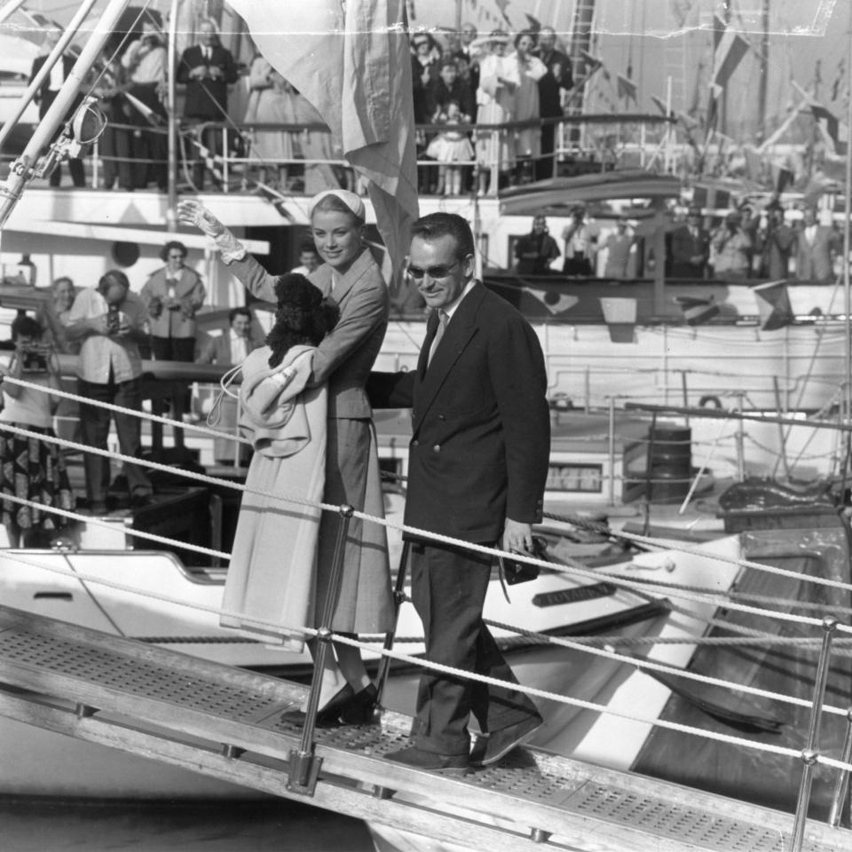 <p>Grace and Rainier of Monaco boarding the Royal yacht 'Deo Juvente 11' for their honeymoon in 1956.</p>