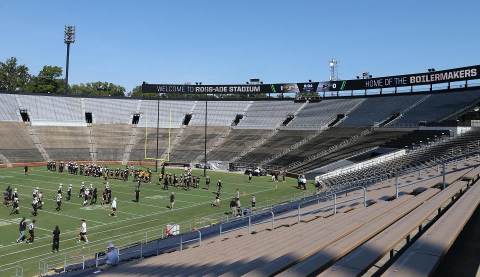 The Purdue Boilermakers take the field Wednesday, Aug. 14, 2024, during Purdue football practice at Ross-Ade Stadium in West Lafayette, Indiana.