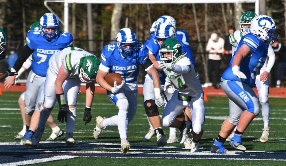 Kennebunk fullback Jonah Barstow, center, breaks loose for a 54-yard TD run in the first quarter of Saturday’s Class B South championship game.