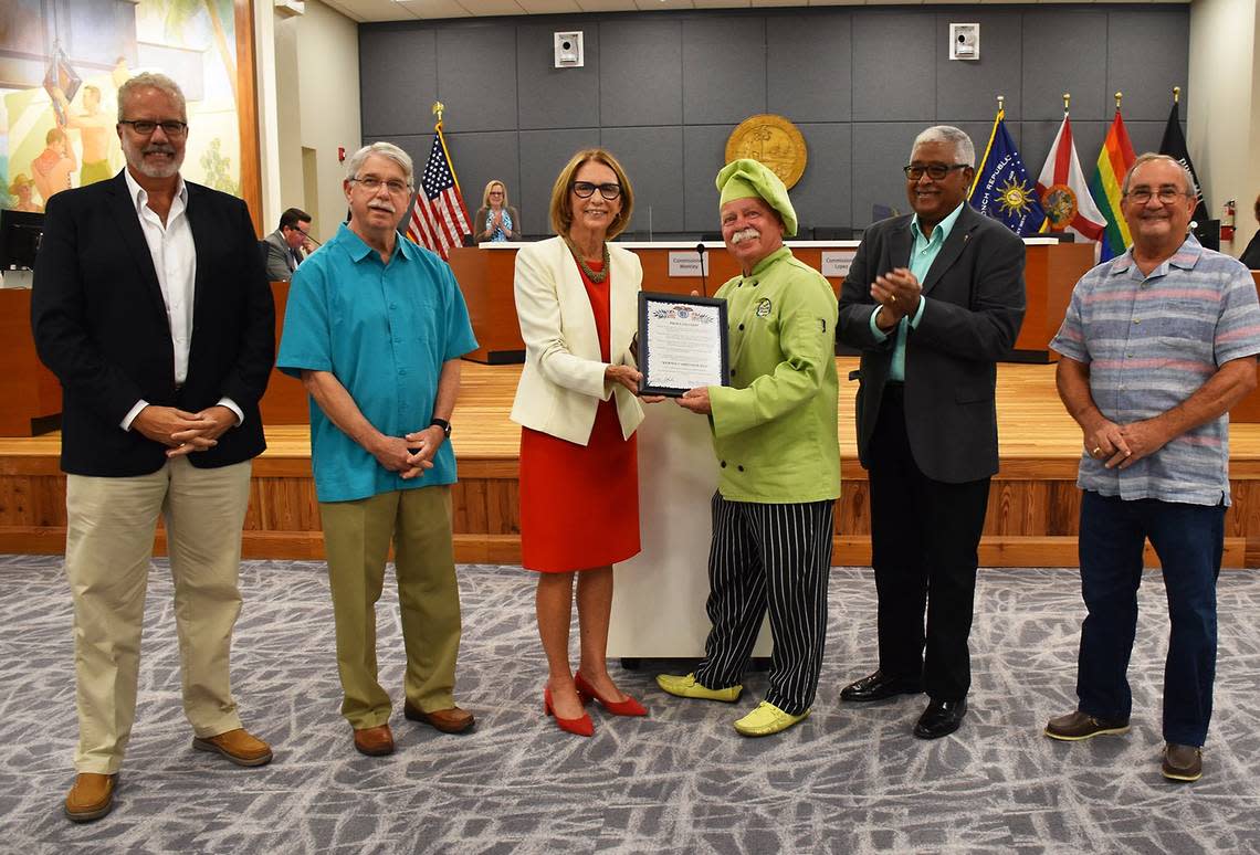 The city of Key West declared July 6, 2022, as “Kermit Carpenter Day,” to honor Carpenter, who has sold Key lime pies in Key West for 30 years. From left, City Commissioner Greg Davila, City Commissioner Jimmy Weekley, Mayor Teri Johnston, Carpenter, City Commissioner Clayton Lopez and City Commissioner Billy Wardlow. 