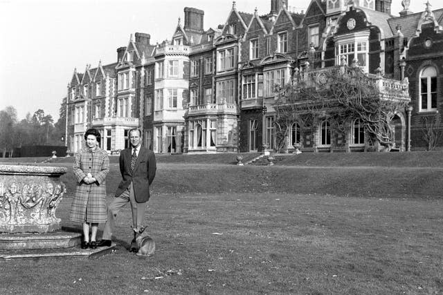 The Queen and Duke of Edinburgh posing in the grounds of Sandringham House, Norfolk. Ron Bell/PA Wire