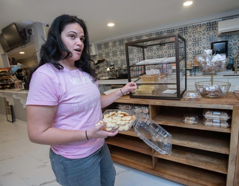 Melissa Simpson, seen here in her downtown Milton business The Sweet Greek on Thursday, March 30, 2023, claims Milton Mayor Heather Lindsay sent an email disparaging her reputation and has requested Lindsay publicly recant the statements.