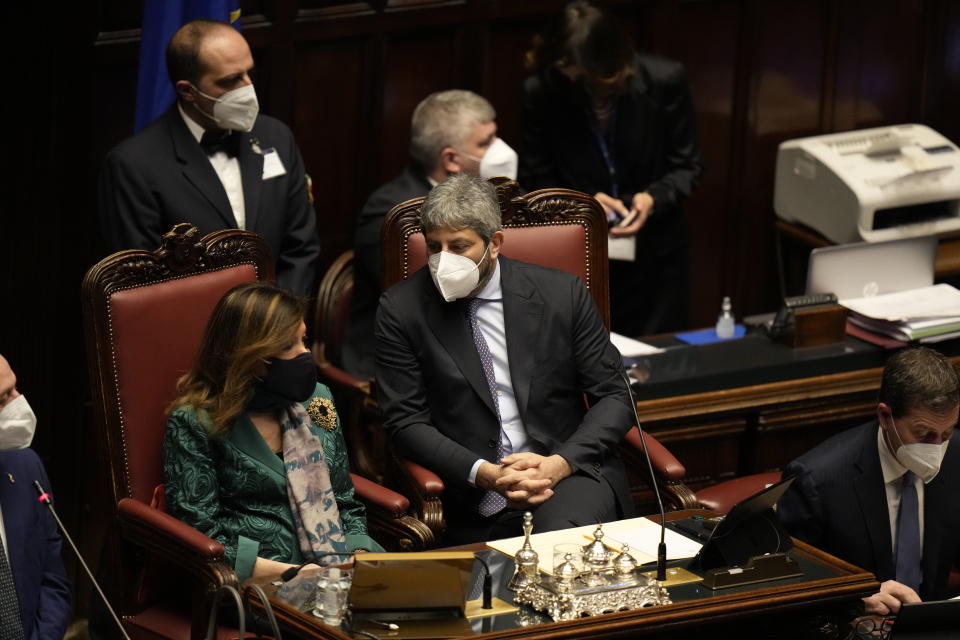 Lower Chamber President Roberto Fico, center, and Senate President Maria Elisabetta Alberti Casellati, left, preside over a voting session in the Italian parliament, in Rome, Tuesday, Jan. 25, 2022, for the election of Italy's 13th president. A first round of voting in Italy's Parliament for the country's next president yielded an avalanche of blank ballots on Monday, as lawmakers and special regional electors failed to deliver a winner amid a political stalemate. (AP Photo/Alessandra Tarantino, pool)