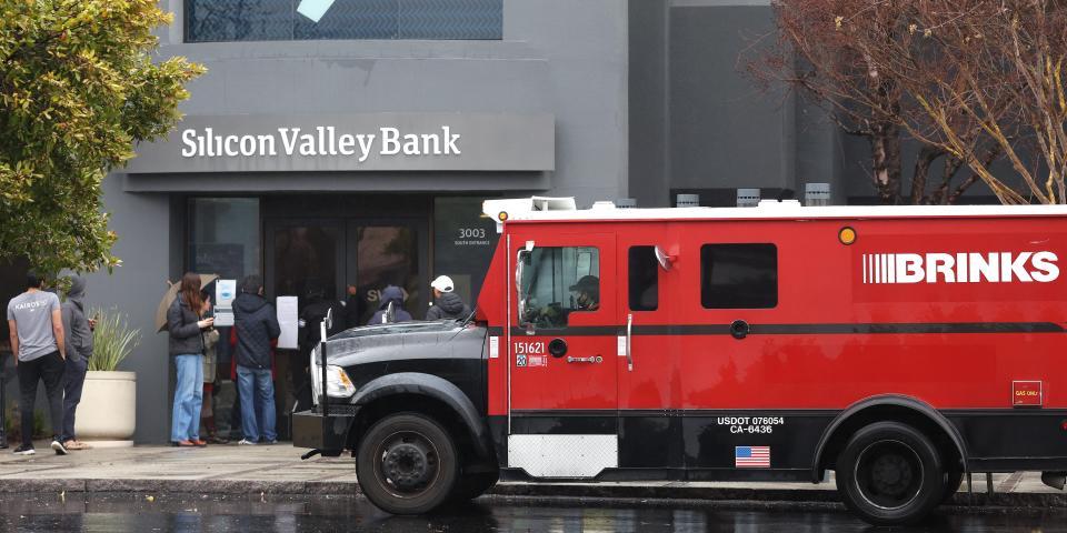 A Brinks armored truck sits parked in front of the shuttered Silicon Valley Bank (SVB) headquarters on March 10, 2023 in Santa Clara, California.