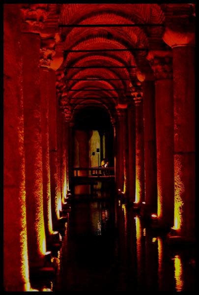 The Basilica Cistern lies underground about 500 feet away from Aya Sofia. It was built in the 6th century during the reign of the Byzantine Emperor Justinian. Constructed as a basilica, the structure became a cistern under the Ottoman Empire and provided a water filtration for the city of Constantinople.