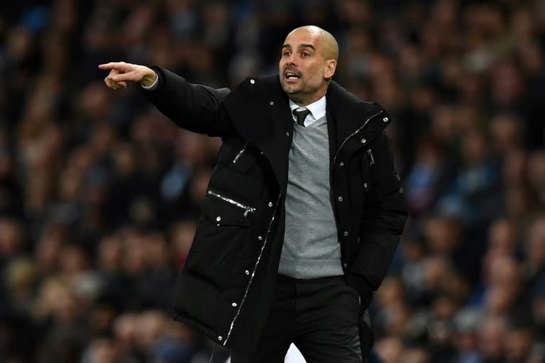 Manchester City's manager Pep Guardiola gestures on the touchline during the English Premier League football match between Manchester City and Stoke City at the Etihad Stadium in Manchester, north west England, on March 8, 2017