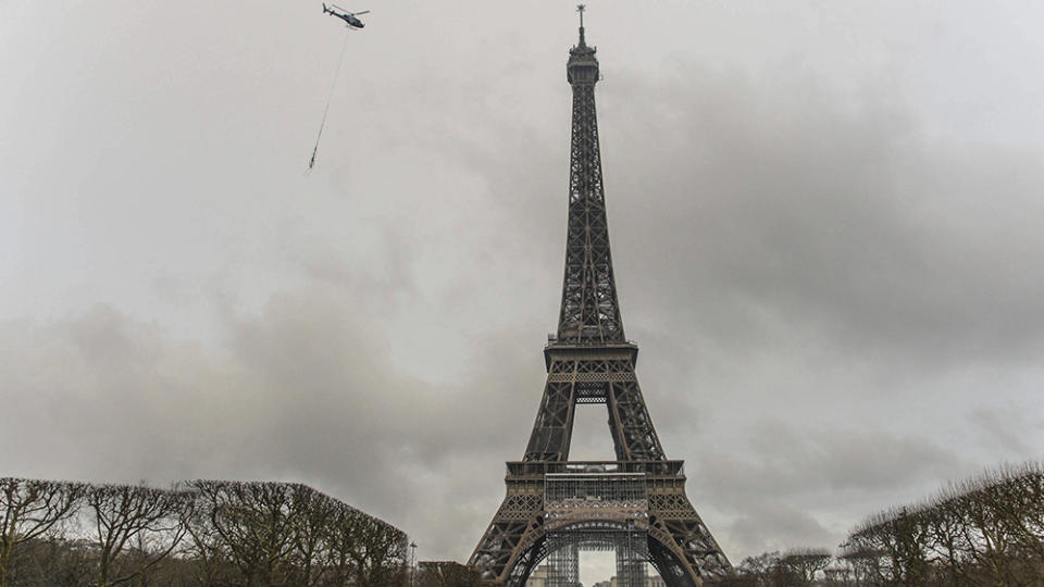 The Eiffel Tower now measures 1,083 feet. - Credit: Isa Harsin/AP