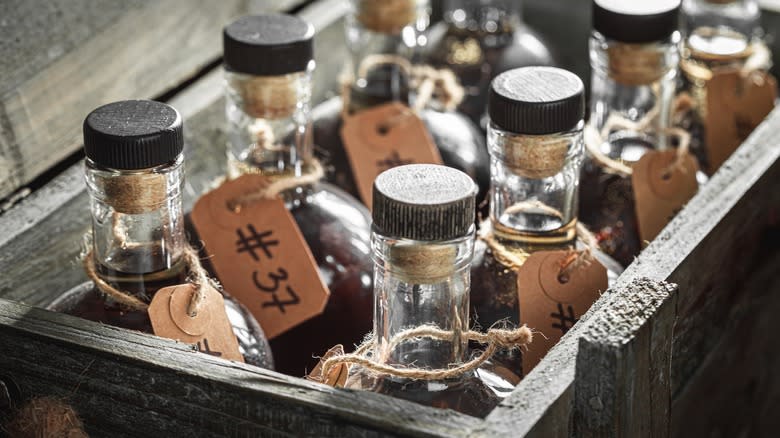 Whiskey bottles in wooden box