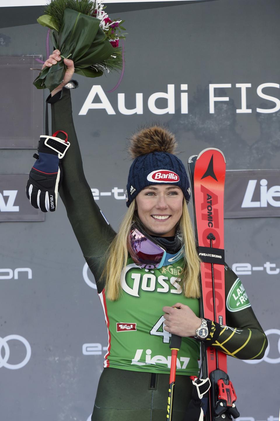 United States' Mikaela Shiffrin celebrates winning an alpine ski, women's World Cup giant slalom, in Lienz, Austria, Saturday, Dec. 28, 2019. (AP Photo/Piermarco Tacca)