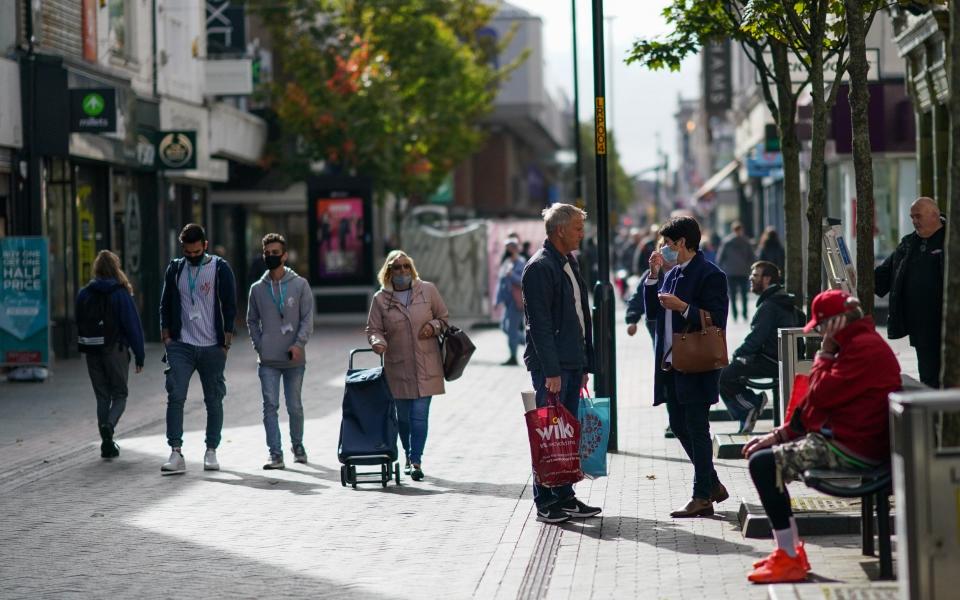 Shoppers walk through Middlesbrough town centre on October 02, 2020 in Middlesbrough, England - Ian Forsyth/Getty Images