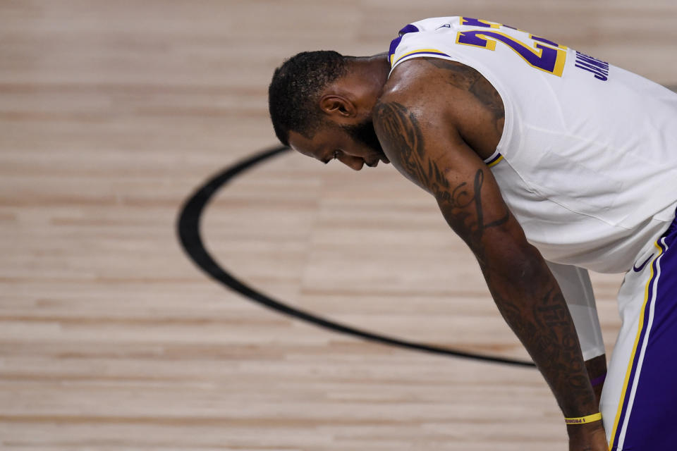 LeBron James (23) of the Los Angeles Lakers takes a breather against the Denver Nuggets during the fourth quarter of Denver's 114-106 win