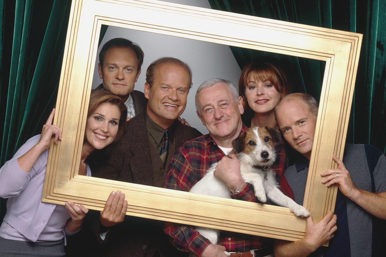 FRASIER -- Season 6 -- Pictured: (l-r) Peri Gilpin as Roz Doyle, David Hyde Pierce as Dr. Niles Crane, Kelsey Grammer as Dr. Frasier Crane, John Mahoney as Martin Crane, Moose as Eddie, Jane Leeves as Daphne Moon, Dan Butler as Bob 'Bulldog' Briscoe