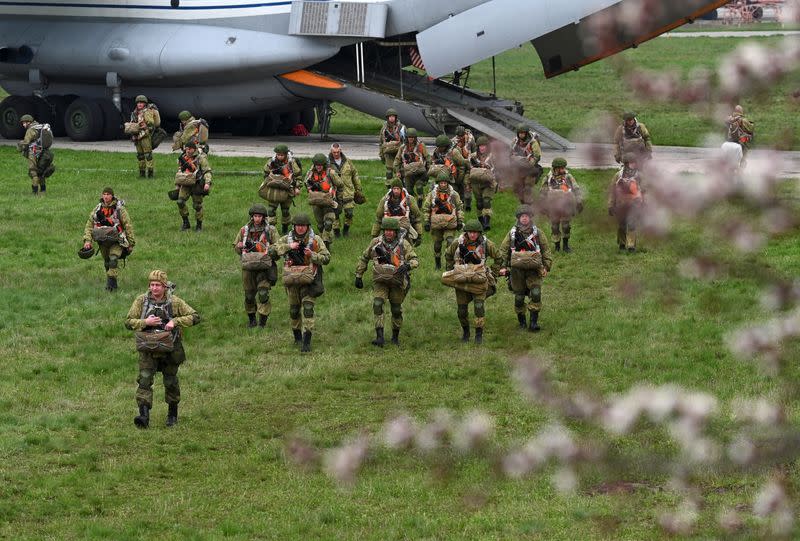 Russian paratroopers take part in drills at a military aerodrome in Taganrog