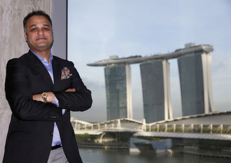 FILE PHOTO: Chairman of UD Group Prateek Gupta poses in his Singapore office